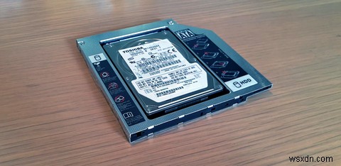 วิธีเปลี่ยนไดรฟ์ดีวีดีแล็ปท็อปของคุณด้วย HDD หรือ SSD 
