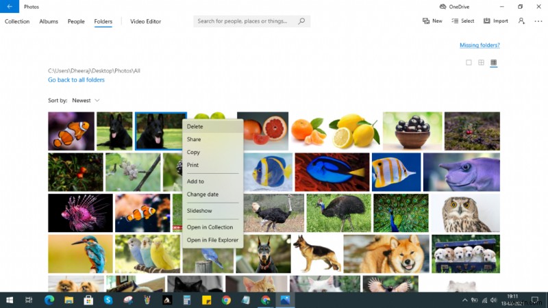 วิธีใช้  รูปภาพ  ของแอปเริ่มต้นของ Microsoft เพื่อลบภาพที่ซ้ำกัน